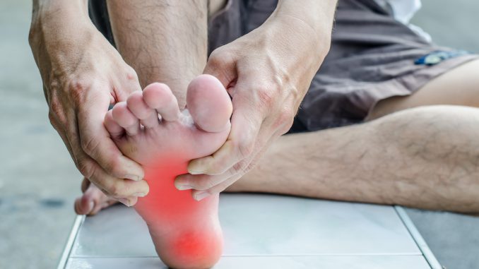 Pain in the foot. Massage of male feet. Pedicures.